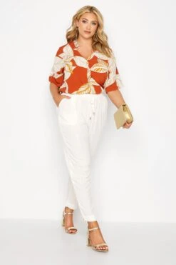 YOURS Curve Orange Leaf Print V-Neck Shirt